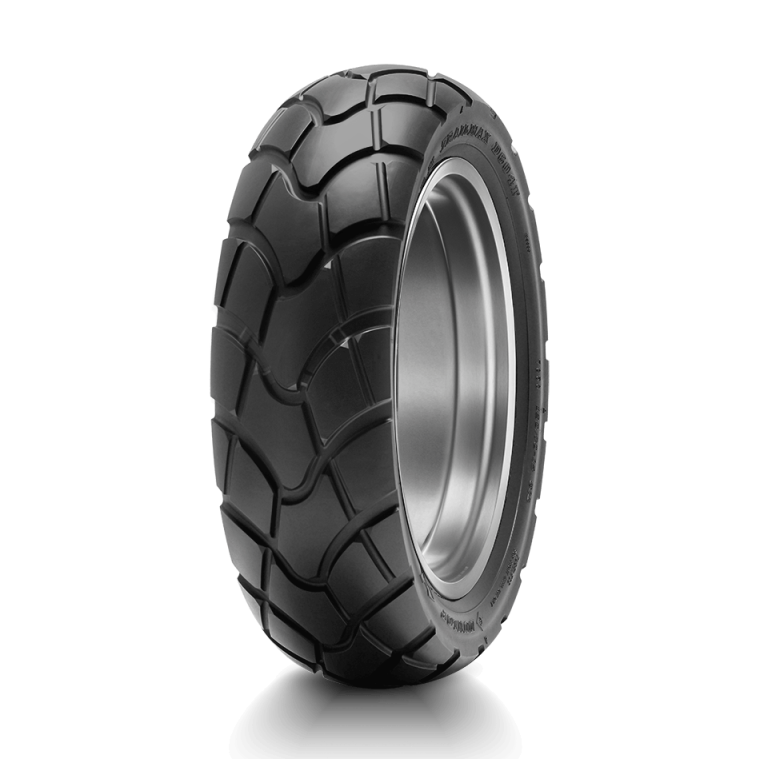 Dunlop D604 front dual-sport motorcycle tire with blocky tread pattern for road and light off-road use