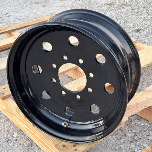 Tow-Rite black modular trailer wheel with 8 on 6.5 bolt pattern and powder-coated steel finish