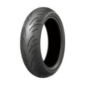 Bridgestone Battlax BT023 rear sport touring motorcycle tire with asymmetric tread pattern for wet weather handling