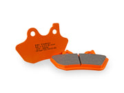 Close-up of EBC FA400V semi-sintered brake pads showing engraved details and NRS backing