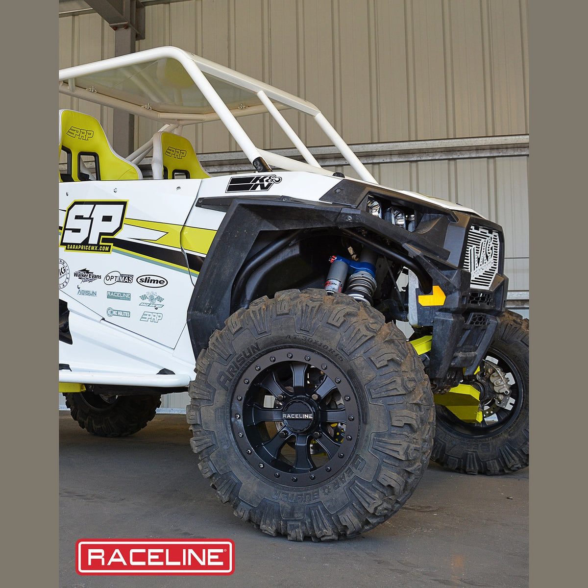 White UTV equipped with matte black Raceline Mamba beadlock wheels