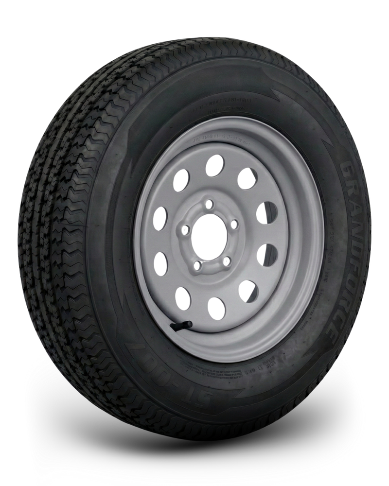 ST205/75R15 8-Ply Trailer Tire on 15" 5-4.5 Silver Modular Wheel