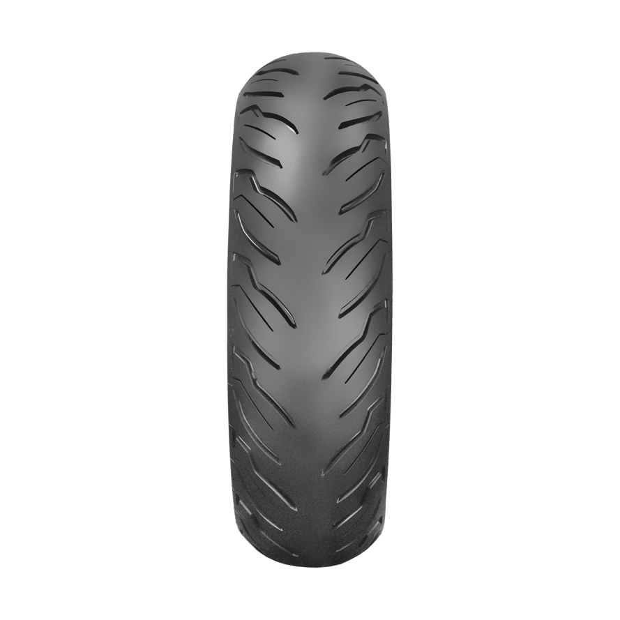 Close-up of Dunlop AE2 rear tire curved staggered groove tread design on black rubber