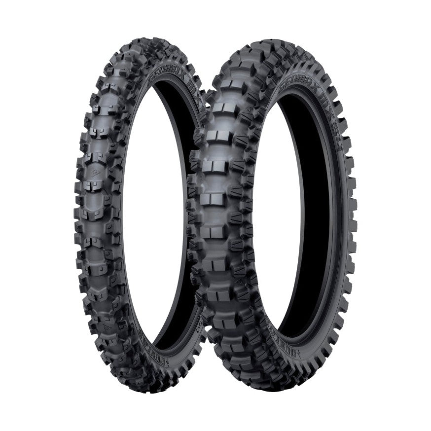 Dunlop Geomax MX54 front dirt bike tire showing aggressive blocky tread pattern and sidewall branding