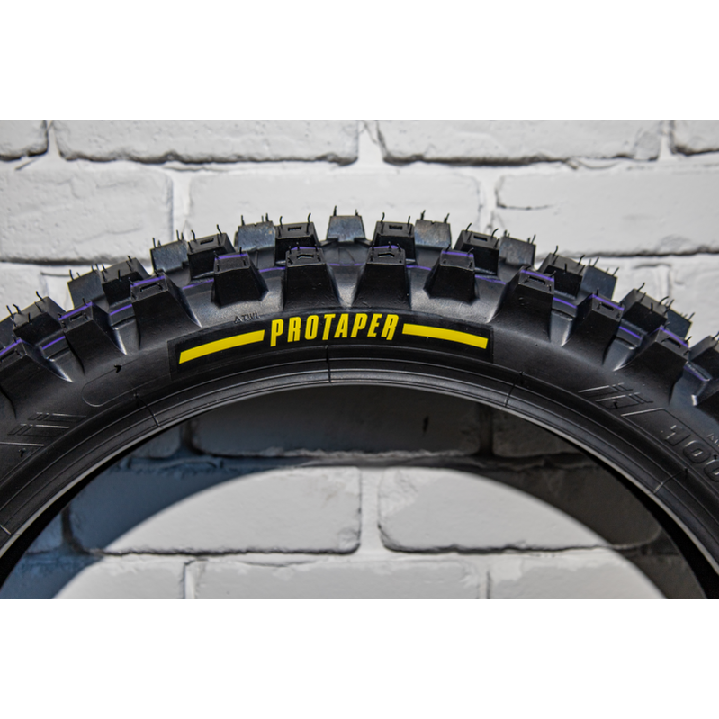 ProTaper logo detail on MXT 04 off-road motorcycle tire sidewall