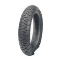 Bridgestone Battlax TH01 front scooter tire showing symmetrical tread pattern and wear indicator