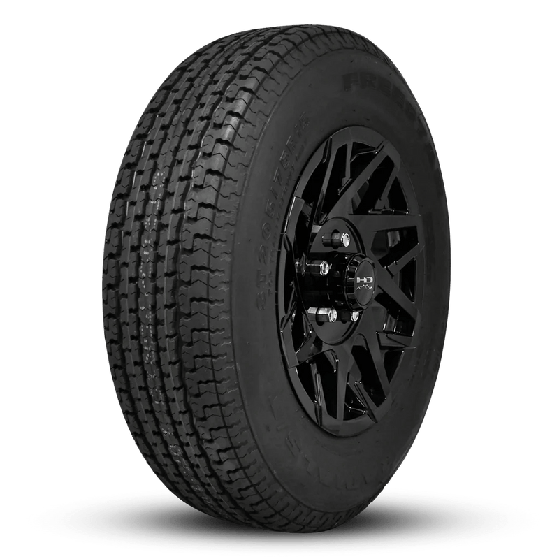ST205/75R15 8 - Ply Trailer Tire on 15" 5 - 4.5 Gloss Black Canyon Wheel - Tires Fast