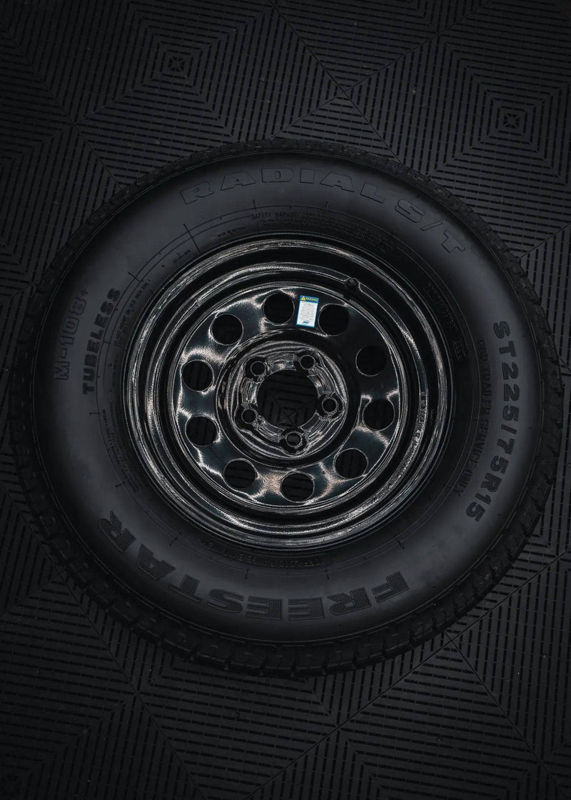 ST225/75R15 10 - Ply Trailer Tire on 15" 5 - 4.5 Black Modular Wheel - Tires Fast